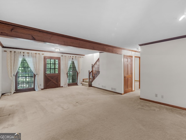 25 Ridgeview Dr, Jonesboro, GA 30236 - unfurnished living room featuring ornamental molding, stairway, and carpet floors