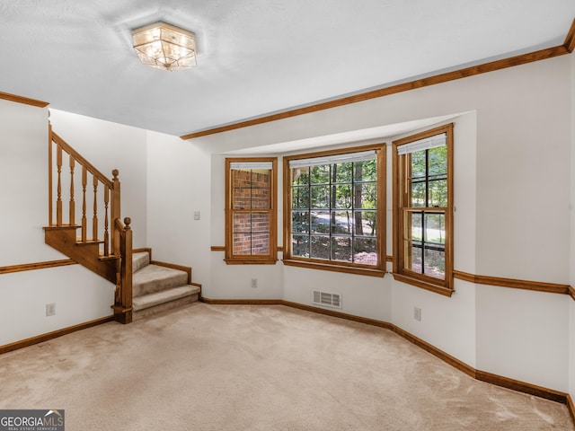 25 Ridgeview Dr, Jonesboro, GA 30236 - carpeted foyer entrance featuring stairway and baseboards
