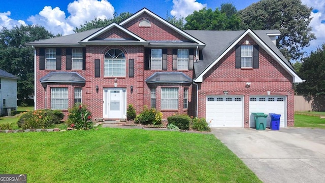 1455 Duren Farms Dr, Lithonia, GA 30058 - view of front of house featuring concrete driveway, a front yard, brick siding, and a garage