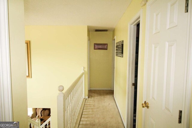 1455 Duren Farms Dr, Lithonia, GA 30058 - corridor featuring an upstairs landing and light colored carpet