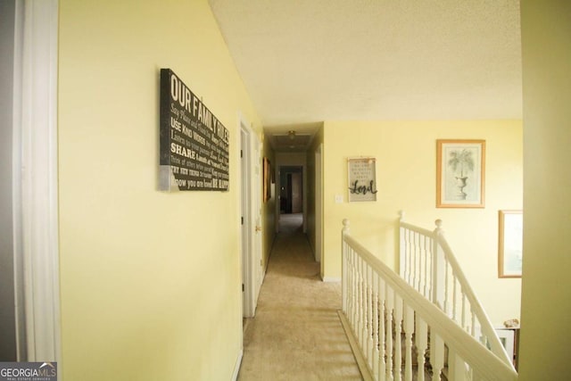 1455 Duren Farms Dr, Lithonia, GA 30058 - hallway with light colored carpet and an upstairs landing