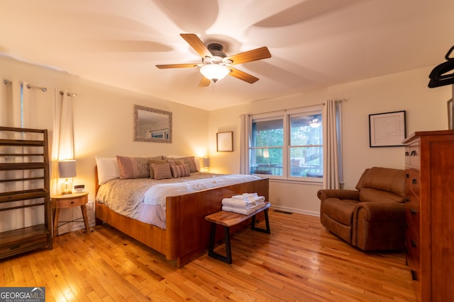 444 Miners Mountain Rd, Sautee Nacoochee, GA 30571 - bedroom featuring light wood finished floors and a ceiling fan