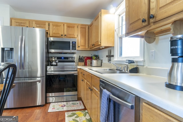 444 Miners Mountain Rd, Sautee Nacoochee, GA 30571 - kitchen with stainless steel appliances, light countertops, and light wood-style floors