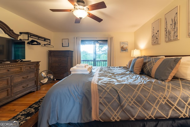 444 Miners Mountain Rd, Sautee Nacoochee, GA 30571 - bedroom featuring access to exterior, wood finished floors, and a ceiling fan