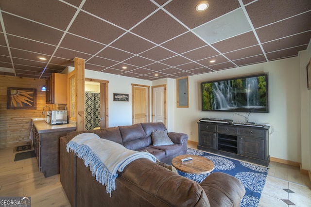 444 Miners Mountain Rd, Sautee Nacoochee, GA 30571 - living room with a paneled ceiling, electric panel, wooden walls, and recessed lighting