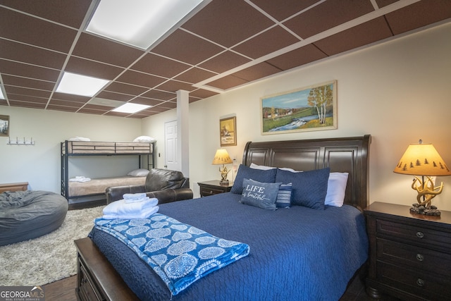 444 Miners Mountain Rd, Sautee Nacoochee, GA 30571 - bedroom with a paneled ceiling and wood finished floors