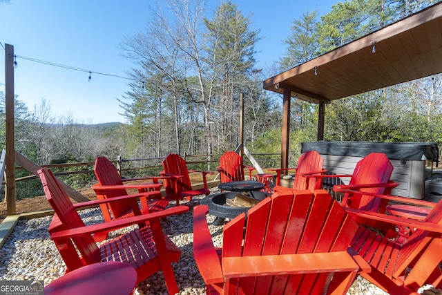 444 Miners Mountain Rd, Sautee Nacoochee, GA 30571 - view of patio / terrace featuring a hot tub and a view of trees