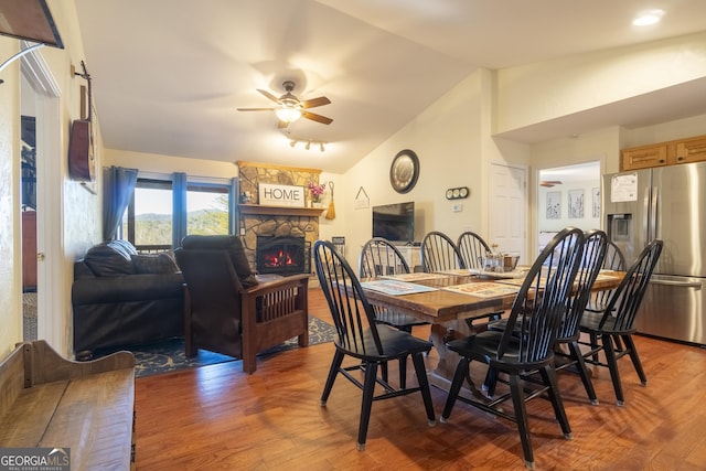 444 Miners Mountain Rd, Sautee Nacoochee, GA 30571 - dining room with ceiling fan, lofted ceiling, wood finished floors, and a fireplace