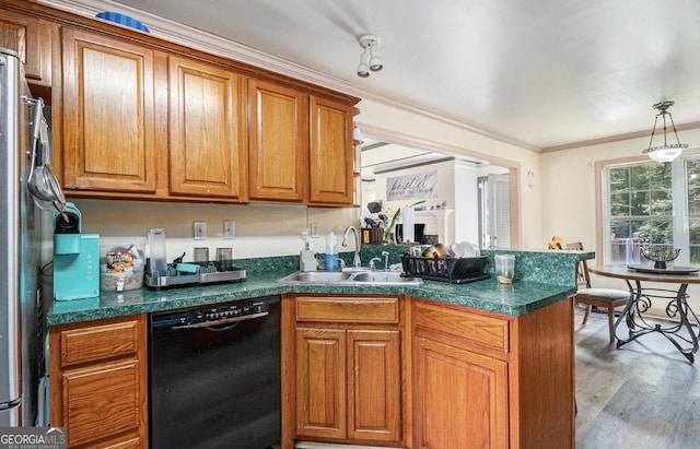 3514 Blackberry, Conyers, GA 30094 - kitchen with black dishwasher, brown cabinets, dark countertops, crown molding, and a peninsula