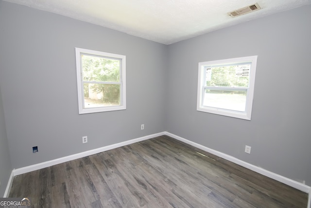 92 Priscilla Dr, Lagrange, GA 30241 - spare room featuring healthy amount of natural light and wood finished floors