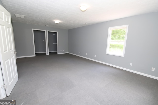 92 Priscilla Dr, Lagrange, GA 30241 - empty room with dark carpet and baseboards