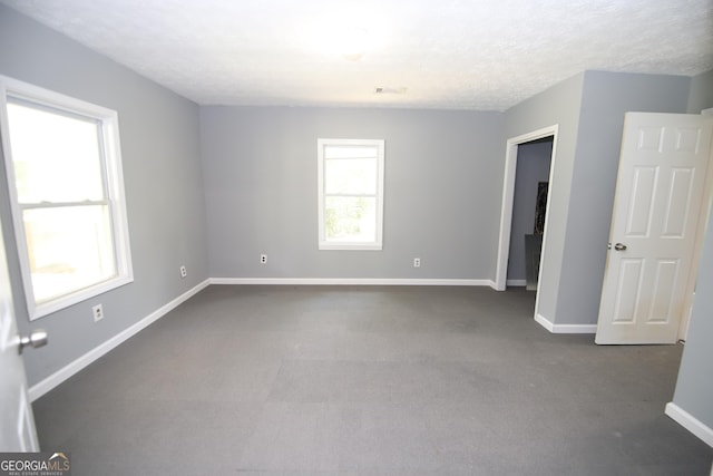 92 Priscilla Dr, Lagrange, GA 30241 - spare room featuring dark carpet and baseboards