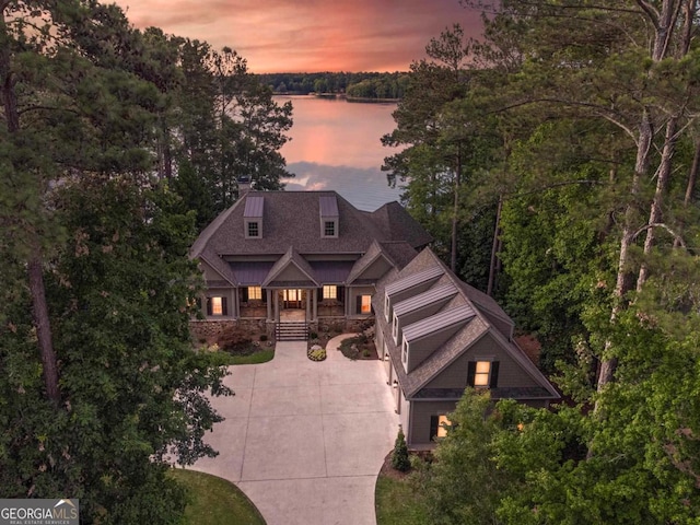 1230 Lake Club Dr, Greensboro, GA 30642 - craftsman-style home with a water view and a porch