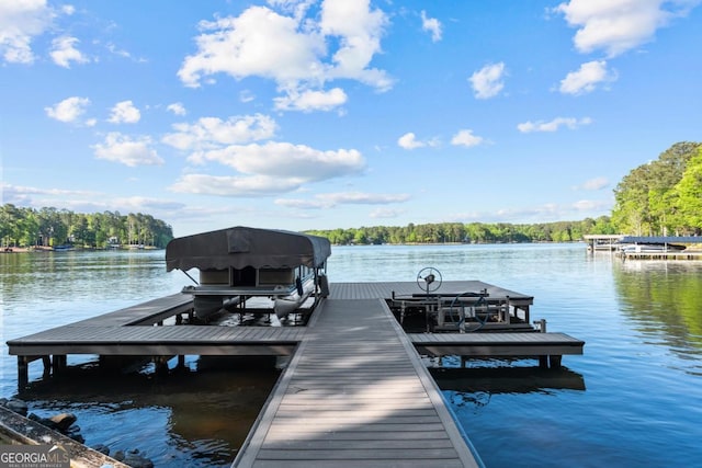 1230 Lake Club Dr, Greensboro, GA 30642 - dock featuring boat lift, a water view, and a view of trees