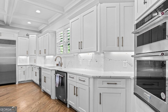 1230 Lake Club Dr, Greensboro, GA 30642 - kitchen featuring appliances with stainless steel finishes, white cabinets, recessed lighting, coffered ceiling, and ornamental molding