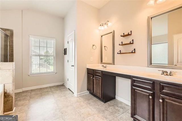 219 Sleepy Way, Canton, GA 30114 - bathroom featuring double vanity and a tile shower