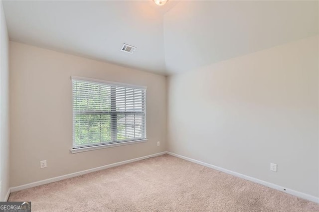 219 Sleepy Way, Canton, GA 30114 - unfurnished room with carpet and vaulted ceiling