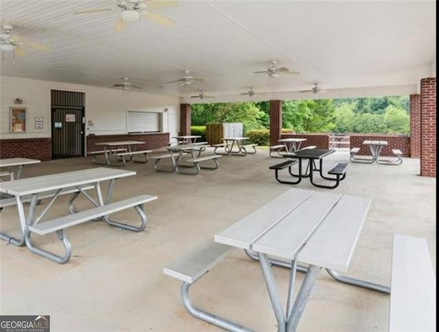 219 Sleepy Way, Canton, GA 30114 - view of patio featuring ceiling fan and outdoor dining space