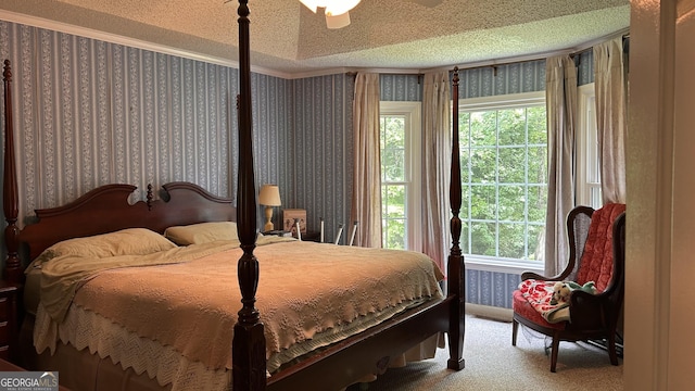 5904 Clairmont Way, Powder Springs, GA 30127 - bedroom featuring wallpapered walls, a textured ceiling, carpet, ceiling fan, and ornamental molding