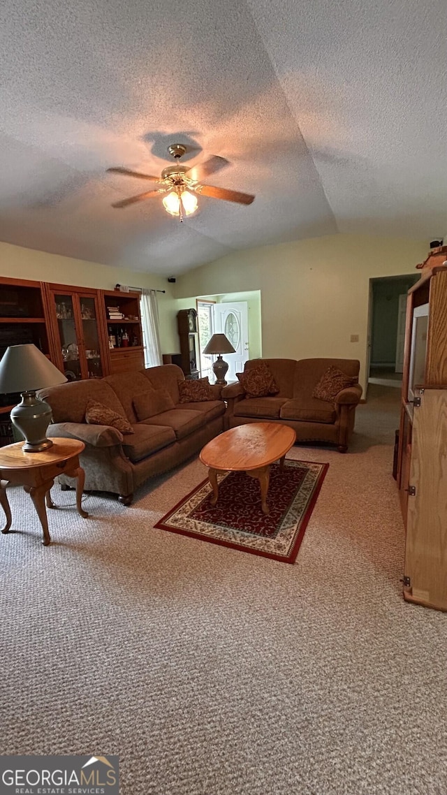 5904 Clairmont Way, Powder Springs, GA 30127 - carpeted living area with a textured ceiling and ceiling fan