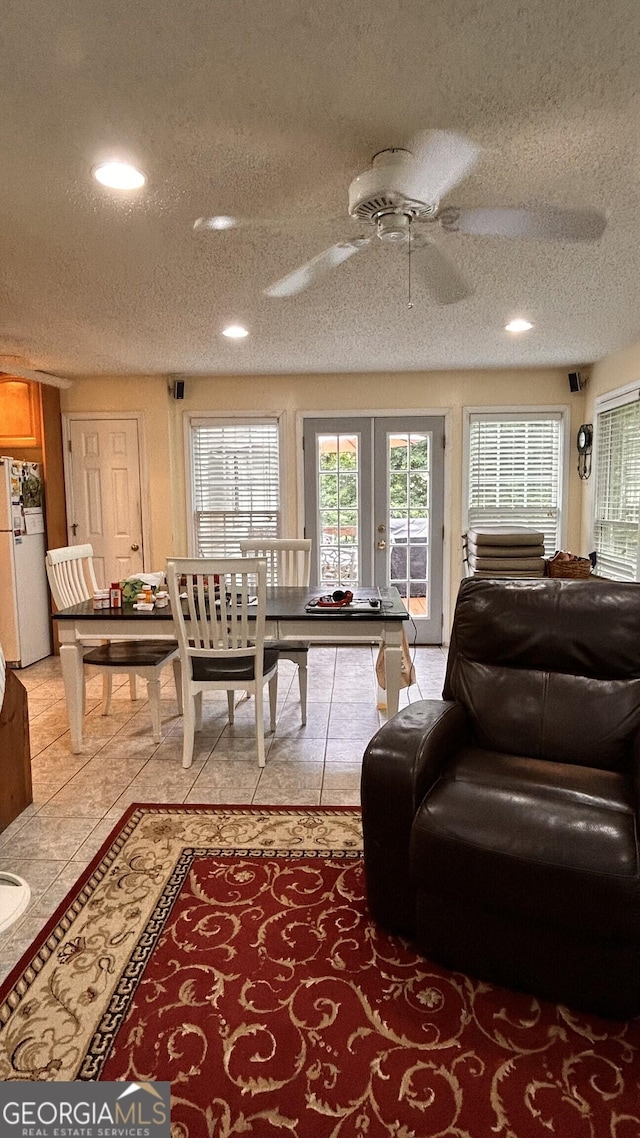 5904 Clairmont Way, Powder Springs, GA 30127 - living room with a textured ceiling, ceiling fan, recessed lighting, french doors, and light tile patterned flooring