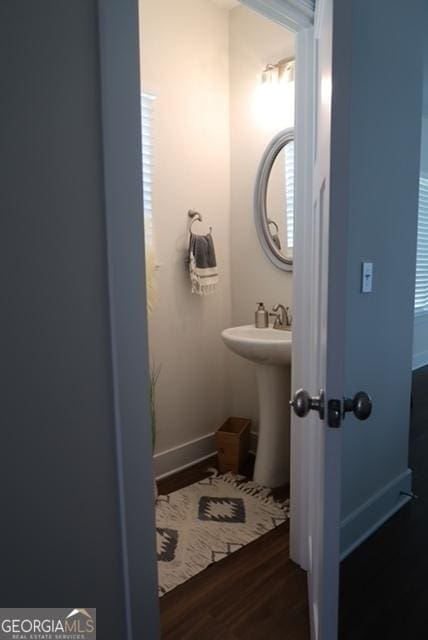 11096 Cornerstone Way, Hampton, GA 30228 - half bathroom with wood finished floors and a sink
