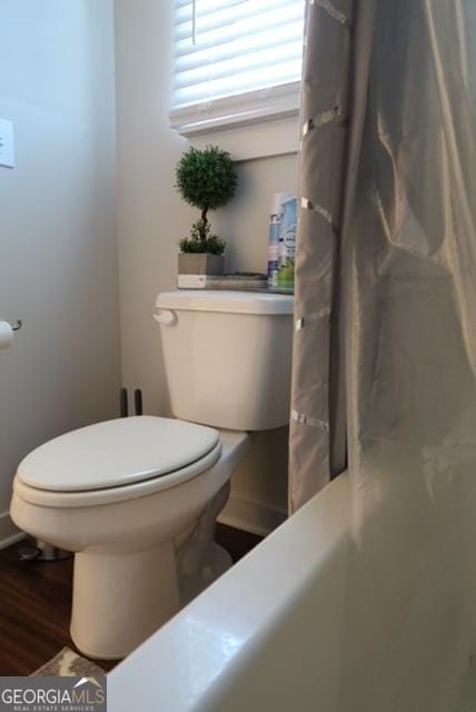 11096 Cornerstone Way, Hampton, GA 30228 - full bathroom with toilet and wood finished floors