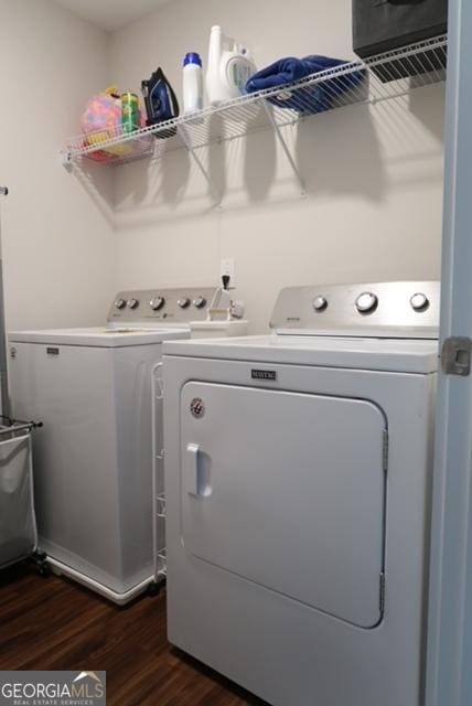 11096 Cornerstone Way, Hampton, GA 30228 - washroom featuring washing machine and dryer and dark wood-style floors