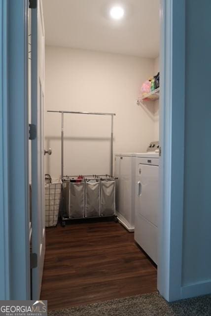 11096 Cornerstone Way, Hampton, GA 30228 - laundry room with washing machine and dryer and dark wood finished floors
