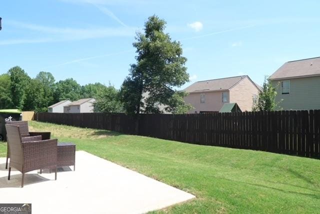 11096 Cornerstone Way, Hampton, GA 30228 - fenced backyard featuring a patio