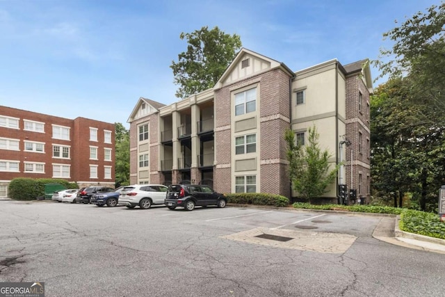 1903 Anjaco Rd NW Unit 5, Atlanta, GA 30309 - view of apartment building / complex featuring uncovered parking