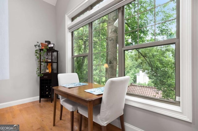 1903 Anjaco Rd NW Unit 5, Atlanta, GA 30309 - dining room featuring baseboards and light wood-type flooring