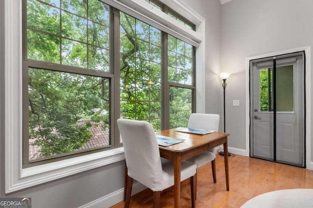 1903 Anjaco Rd NW Unit 5, Atlanta, GA 30309 - dining room featuring baseboards and light wood-type flooring