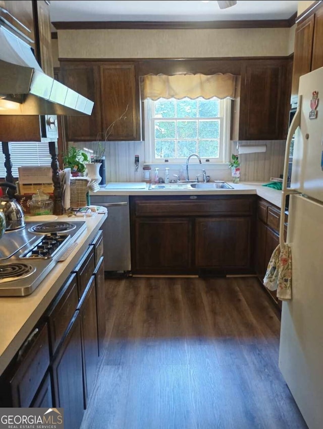 1806 Dawson Rd, Albany, GA 31707 - kitchen with stainless steel appliances, dark wood finished floors, under cabinet range hood, and light countertops