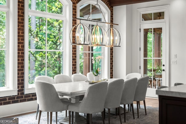 4874 Kettle River Pt, Suwanee, GA 30024 - dining room featuring a chandelier