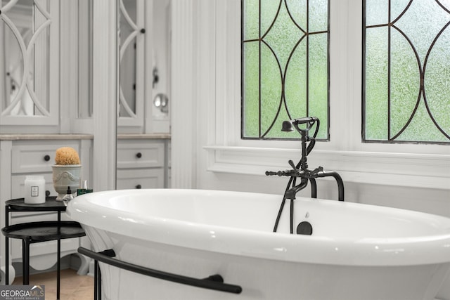 4874 Kettle River Pt, Suwanee, GA 30024 - full bathroom with a soaking tub