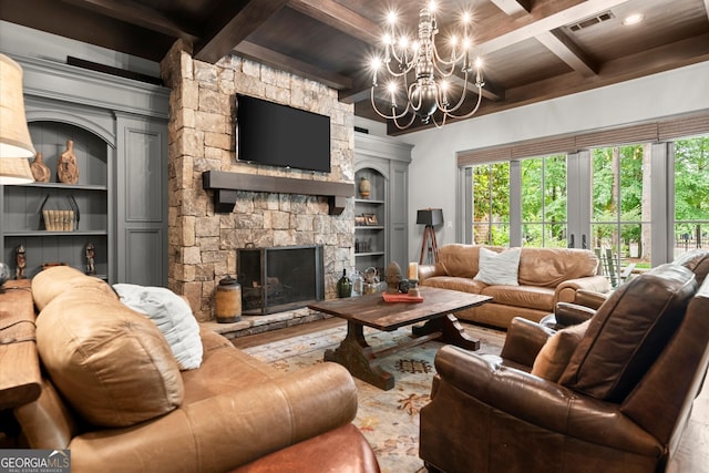 4874 Kettle River Pt, Suwanee, GA 30024 - living room featuring hardwood / wood-style floors, beamed ceiling, a stone fireplace, coffered ceiling, and built in shelves