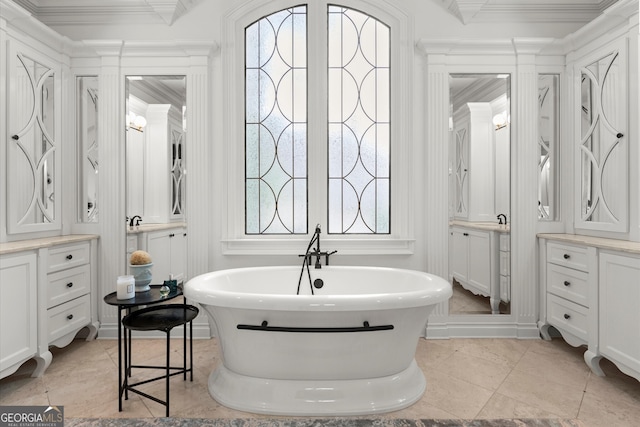 4874 Kettle River Pt, Suwanee, GA 30024 - full bathroom featuring a soaking tub and crown molding
