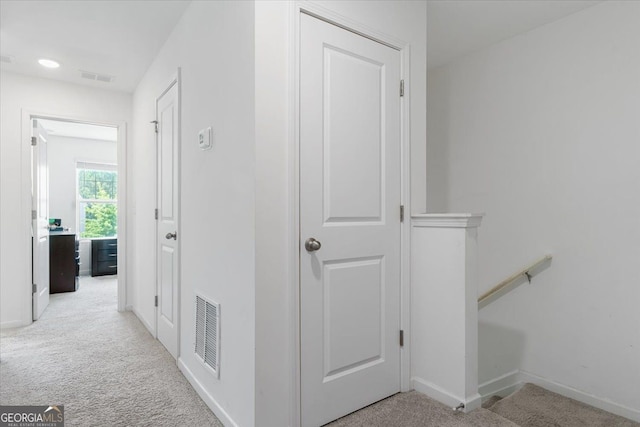 161 Swindon Dr, Mcdonough, GA 30253 - hallway with carpet floors and an upstairs landing