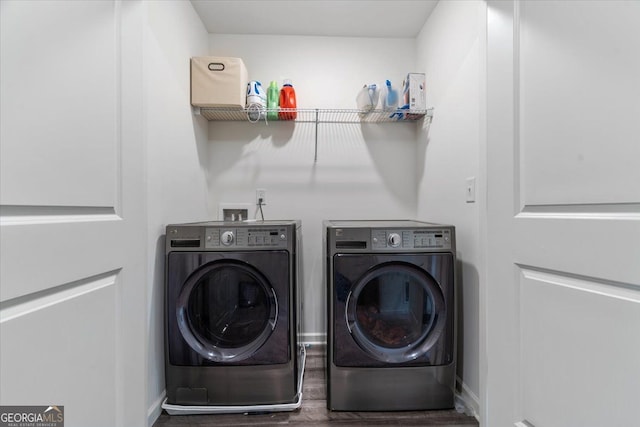 161 Swindon Dr, Mcdonough, GA 30253 - washroom with washing machine and clothes dryer and wood finished floors