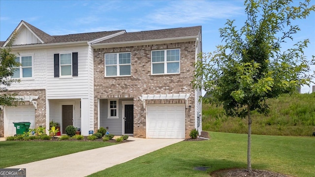 161 Swindon Dr, Mcdonough, GA 30253 - townhome / multi-family property featuring a front lawn, driveway, an attached garage, brick siding, and board and batten siding