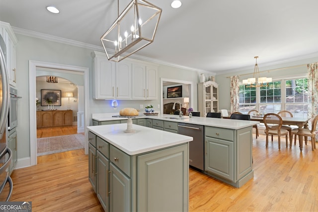 3095 Chattahoochee Trce, Gainesville, GA 30506 - kitchen with dishwasher, a center island, gray cabinets, a chandelier, and crown molding