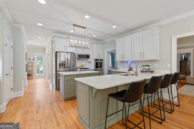 3095 Chattahoochee Trce, Gainesville, GA 30506 - kitchen featuring stainless steel appliances, a peninsula, a center island, a breakfast bar area, and recessed lighting