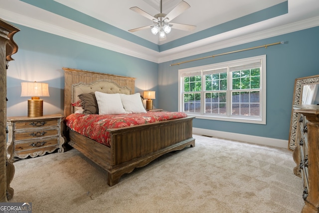 3095 Chattahoochee Trce, Gainesville, GA 30506 - carpeted bedroom with a tray ceiling, ornamental molding, and a ceiling fan