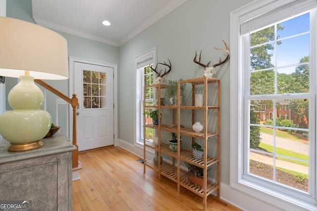 3095 Chattahoochee Trce, Gainesville, GA 30506 - entryway with plenty of natural light, ornamental molding, light wood-type flooring, and recessed lighting