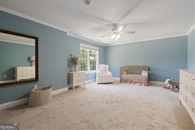 3095 Chattahoochee Trce, Gainesville, GA 30506 - bedroom with ornamental molding, a crib, carpet flooring, and a ceiling fan