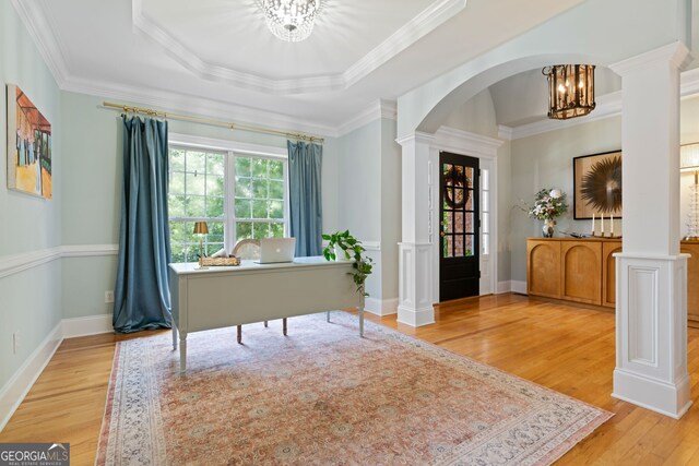 3095 Chattahoochee Trce, Gainesville, GA 30506 - office area featuring a chandelier, light wood finished floors, arched walkways, ornate columns, and a tray ceiling