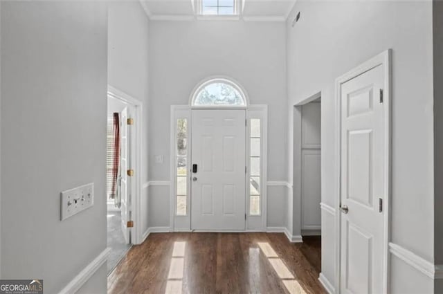 4021 Melvin Dr, Atlanta, GA 30331 - foyer entrance with a towering ceiling, wood finished floors, and ornamental molding