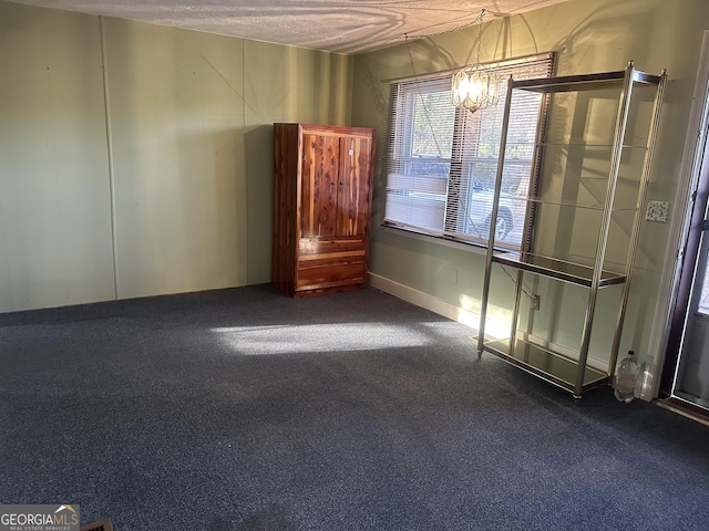 421 Chase Cir, Cornelia, GA 30531 - carpeted empty room with a chandelier