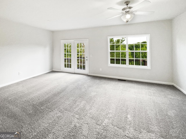 2438 Suwanee Pointe Dr, Lawrenceville, GA 30043 - unfurnished room featuring a ceiling fan and carpet floors